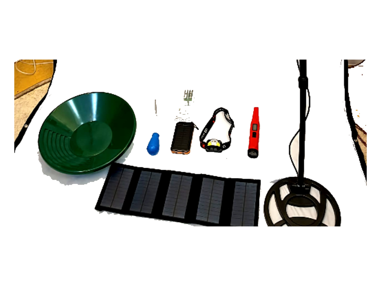 Gold Rush kit contents laid out — gold pan, solar panel, search coil, pinpointer, headlamp and tools