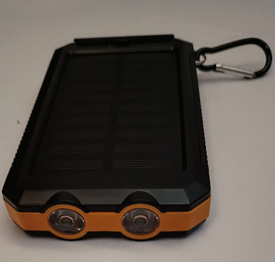 The solar power bank with twin LED work lamps and a carabiner clip