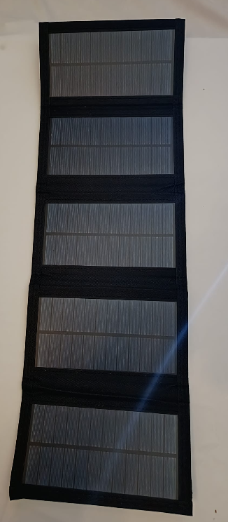 The foldable solar panel for charging gear off-grid in the field